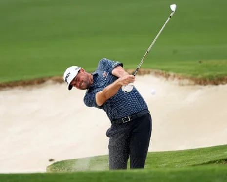 Keegan Bradley hits out of a fairway bunker during the Truist Championship