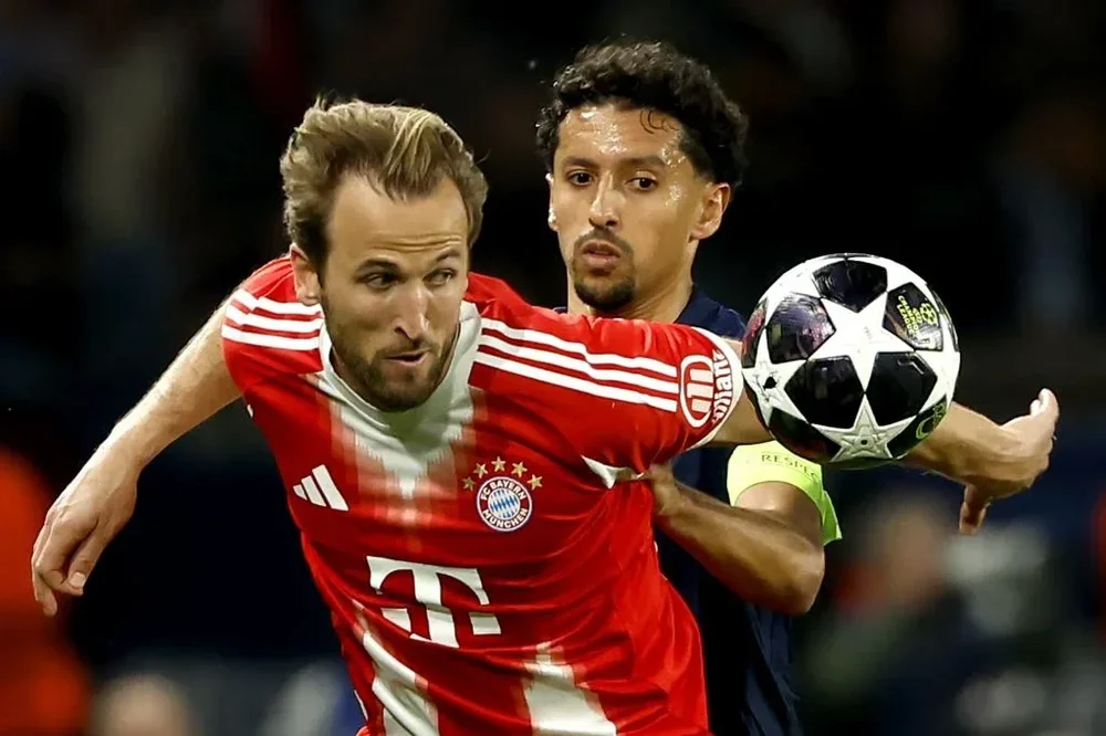 Harry Kane y&nbsp;Marquinhos durante una acción del partido